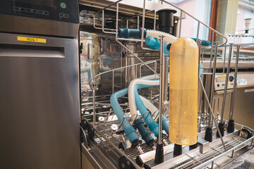 inthesterilization department of a hospital, anesthesia tubes are cleaned in a washing machine