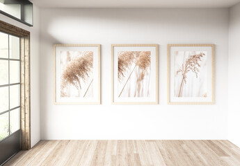 three Frames in a Room with Large Windows