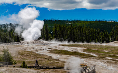 Geyser Old Faithful erupts in Yellowstone National Park in Wyoming, US
