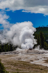 Geyser Old Faithful erupts in Yellowstone National Park in Wyoming, US