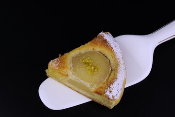 close up Pear Tart on Black background