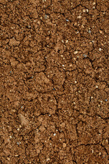 dried and cracked red earth close-up