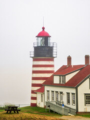 USA, Maine. West Quoddy Head Light at Quoddy Head State Park in Lubec, Maine. Easternmost point in the United States.