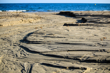 Textures on the beach sand after the storm