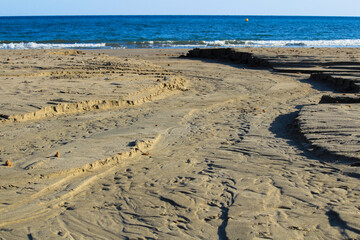 Textures on the beach sand after the storm