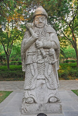 China, Nanjing, military official statue on the Spirit Way  to Xiao ling Mausoleum. The place has harmony and serenity atmosphere. - 419257723