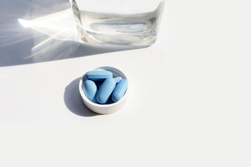 PrEP ( Pre-Exposure Prophylaxis) used to prevent HIV with glass of water