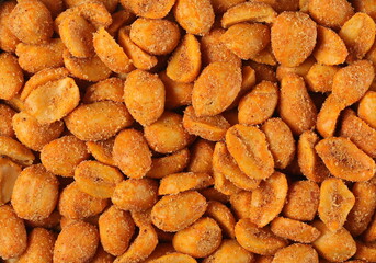 Chili spicy peanuts pile background and texture, top view