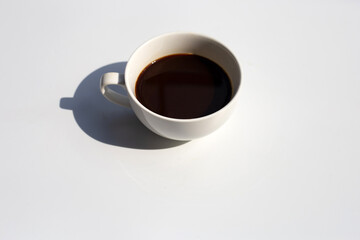 Cup of coffee on white background.