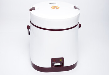 A picture of portable rice cooker on isolated white background.