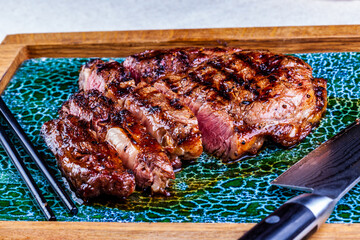 Sliced grilled meat steak Rib-eye. Close up