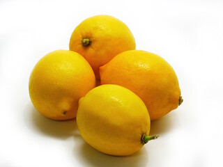 Four lemons on white background