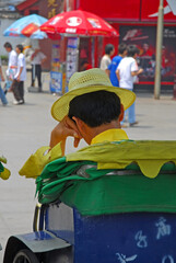 China, Nanjing, a popular rickshaw driver resting in Fuzimiao. - 419265936