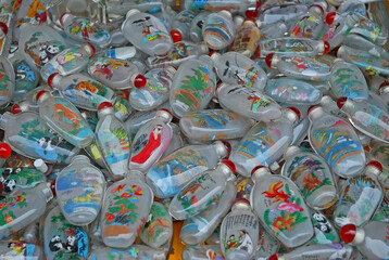 China, Nanjing, colorful Chinese decorated bottles  in a Fuzimiao market shop.  - 419266340