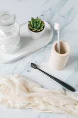 Fluffy toothbrushes in bathroom setting, modern bathroom