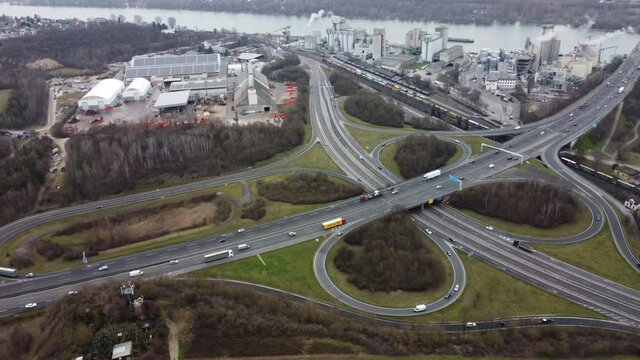 Aerial view of a highway, intersections and bridge - drone point of view