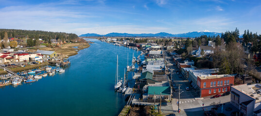 Aerial View of the Tourist Town La Conner, Washington. La Conner is one of the best places to visit in spring with its brilliant fields of daffodils and the yearly Skagit Valley Tulip Festival.