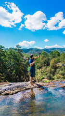 Travel influencer in the river and nature Honduras Central America