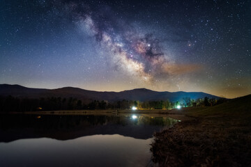 The Milky Way rises and shines over Lake Arrowhead and Shenandoah National Park just outside the town of Luray, Virginia.