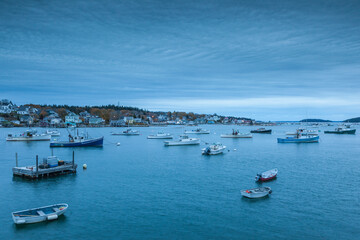 Fototapeta na wymiar USA, Maine, Stonington. Stonington Harbor at dusk