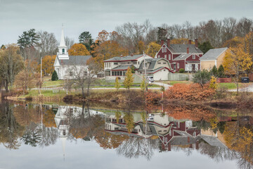 USA, Maine Orland, village reflection during autumn.