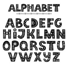 Alphabet hand drawn letters in folk style. 