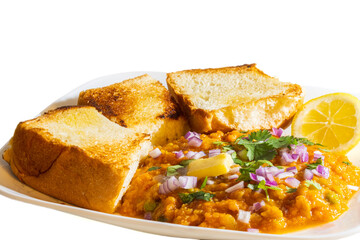 Delicious Indian Street Food called Pav Bhaji Includes Fried Bread Served with Spicy Mixed Vegetable Curry Sprinkled with Onion, Cilantro and Butter