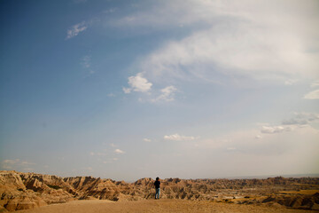 Man contemplating the Badlands