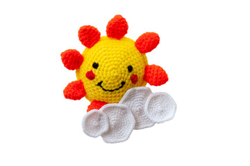 Sun and clouds from crochet yarn is handcraft for decoration isolated on white background.
