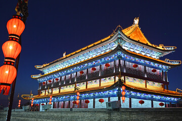 traditional chinese building with lantern at night in city XiAn