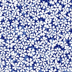 Ditsy floral pattern on blue background. Seamless vector pattern.