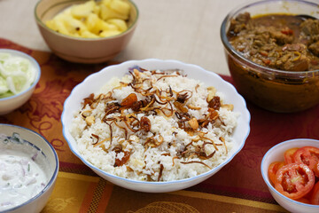 Chicken biryani Spicy Indian Malabar biryani Hyderabadi biryani, Dum Biriyani pulao Kerala India Sri Lanka Pakistan basmati rice mixed rice dish with meat curry Ramadan Kareem, Eid