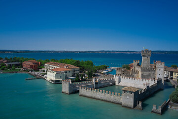 Sirmione, Lake Garda, Italy. Aerial view of Sirmione Castle. Blue sky in the background