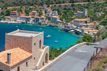 Fototapeta na wymiar Panoramic view of Limeni village. The picturesque villlage with the turquoise waters and the stone buildings under Areopoli, peloponnese , Greece.