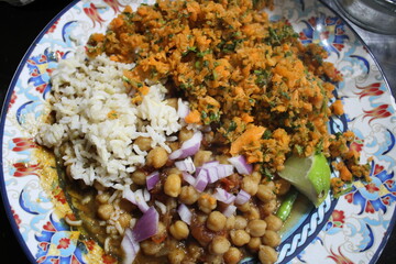 Chole, carrot pickle and basmati rice