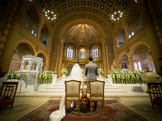Wedding ceremony of bride and groom in church