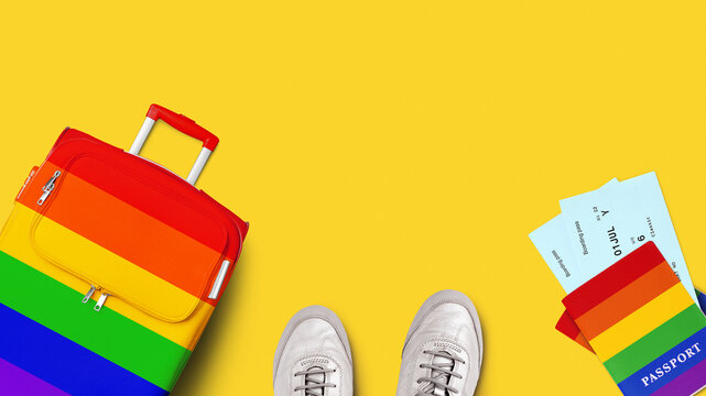 LGBT pride people travel banner, summer holidays, vacation, tourism, LGBTQ community rainbow flag colors suitcase, passport, airplane boarding pass, flight ticket, shoes, yellow background, copy space