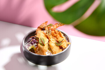 Restaurant seafood - Tempura shrimp & almond and cabbage salad. Appetizer food plate on white table...