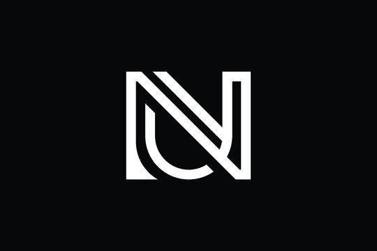 NU logo letter design on luxury background. UN logo monogram initials letter concept. NU icon logo design. UN elegant and Professional letter icon design on black background. N U UN NU