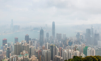 Fototapeta na wymiar Victoria Harbor view from the Peak in Fog, Hong Kong