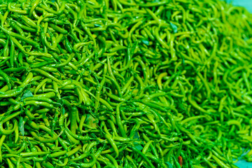 Green chilli peppers in Indian market