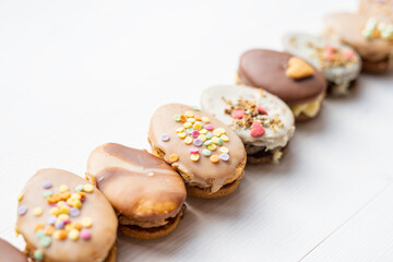 homemade easter spring chocolate egg cookies decorated with sprinkels 