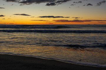 A beautiful sunrise from the shore of the beach