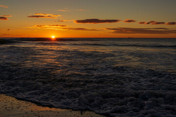 A beautiful sunrise from the shore of the beach