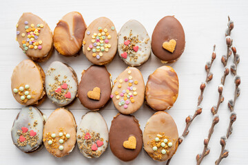 homemade easter spring chocolate egg cookies decorated with sprinkels 