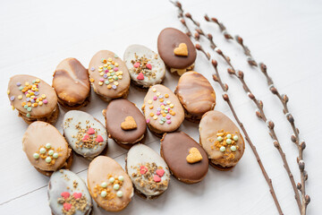 homemade easter spring chocolate egg cookies decorated with sprinkels 