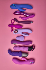 Colourful Dildo, vibrator in sex shop assortment. toys for adults, sensuality, excitement concept....