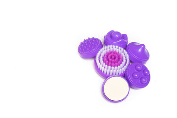 Electric isolate facial massager . Purple massager. Facial care. Cosmetology. Women's care . Article about the health of the face . . Copy space