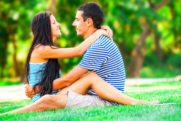 Young teen couple kissing at outdoor