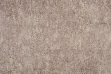 Textured background of velvet beige fabric